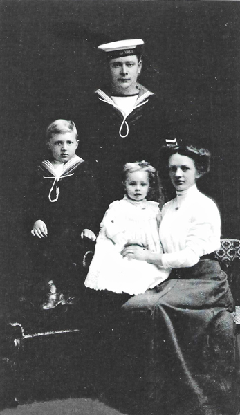 Harry Foskett in uniform with wife and children